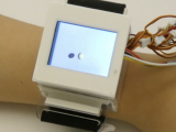 RetroShape: Leveraging Rear-Surface Shape Displays for 2.5D Interaction on Smartwatches